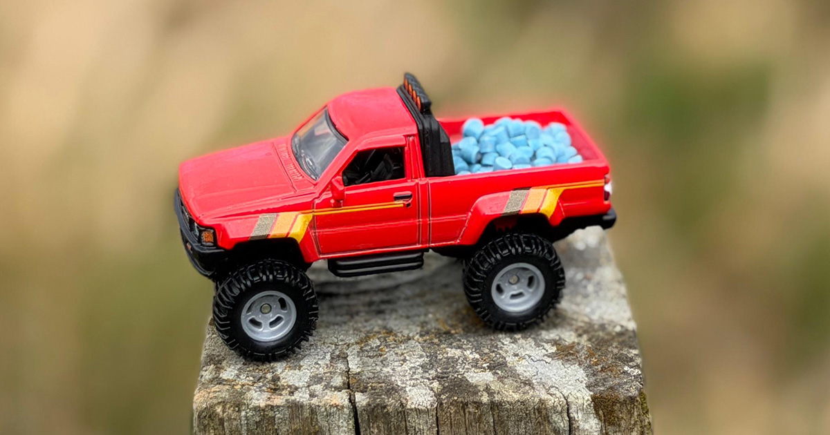 A Toyota Hi-Lux carrying a load of slug pellets.